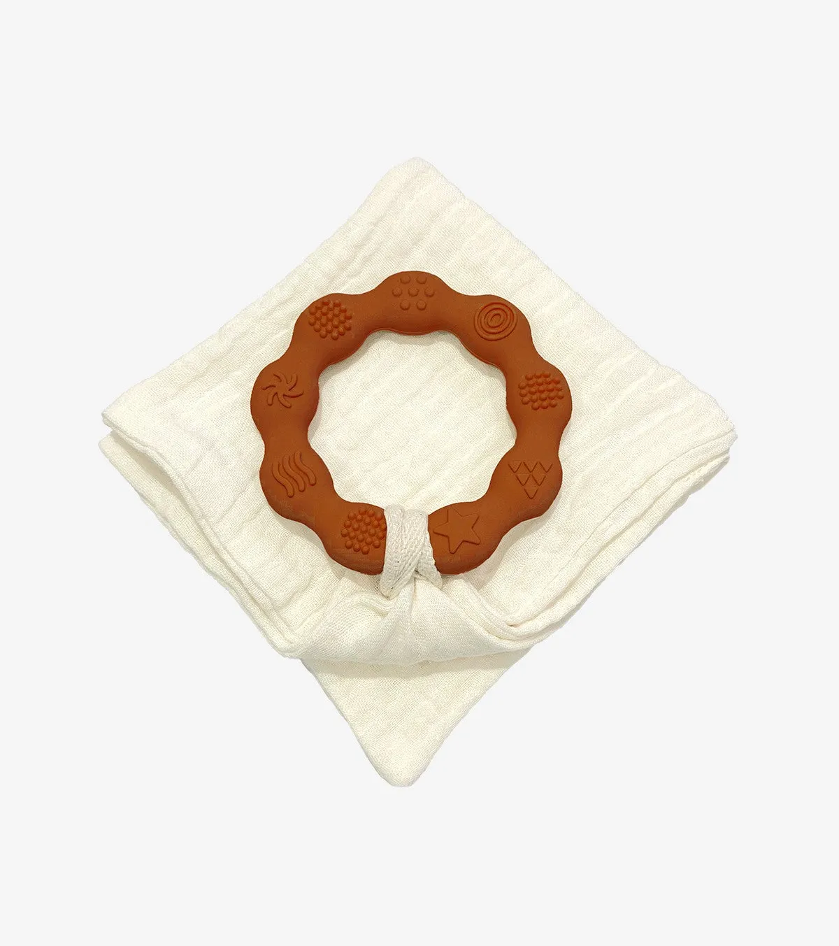 Brown Teething Ring And Diaper