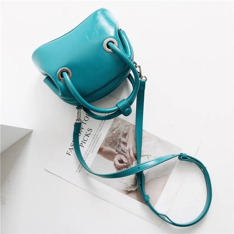 Mini Leather Circle Top Handle Bag
